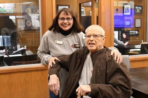 Tom Sherman and Julie Owens are pictured at the bank's 100th anniversary.