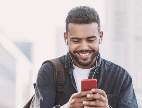 A man using a mobile phone outside